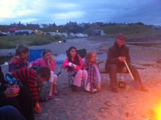 By_the_fire_at_port_soy